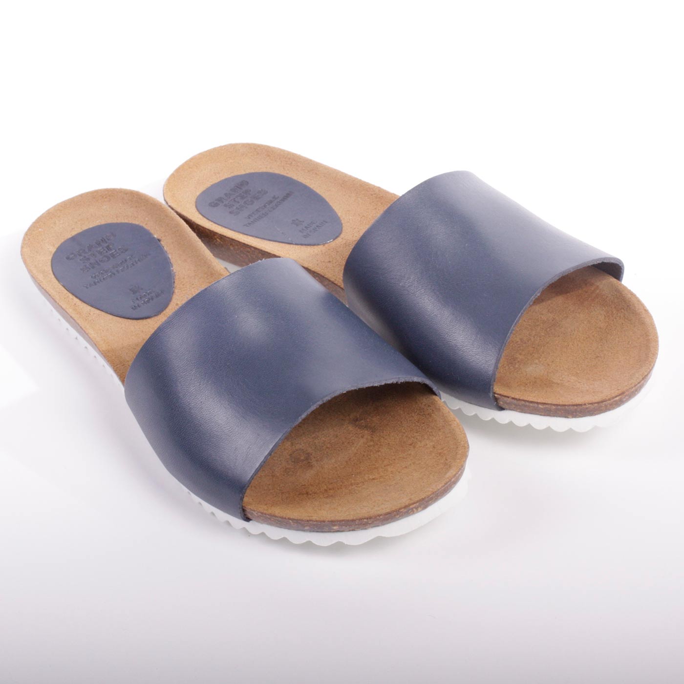 Kiezen woordenboek Geit Navyblauwe dames slippers met plantaardig gelooid leer